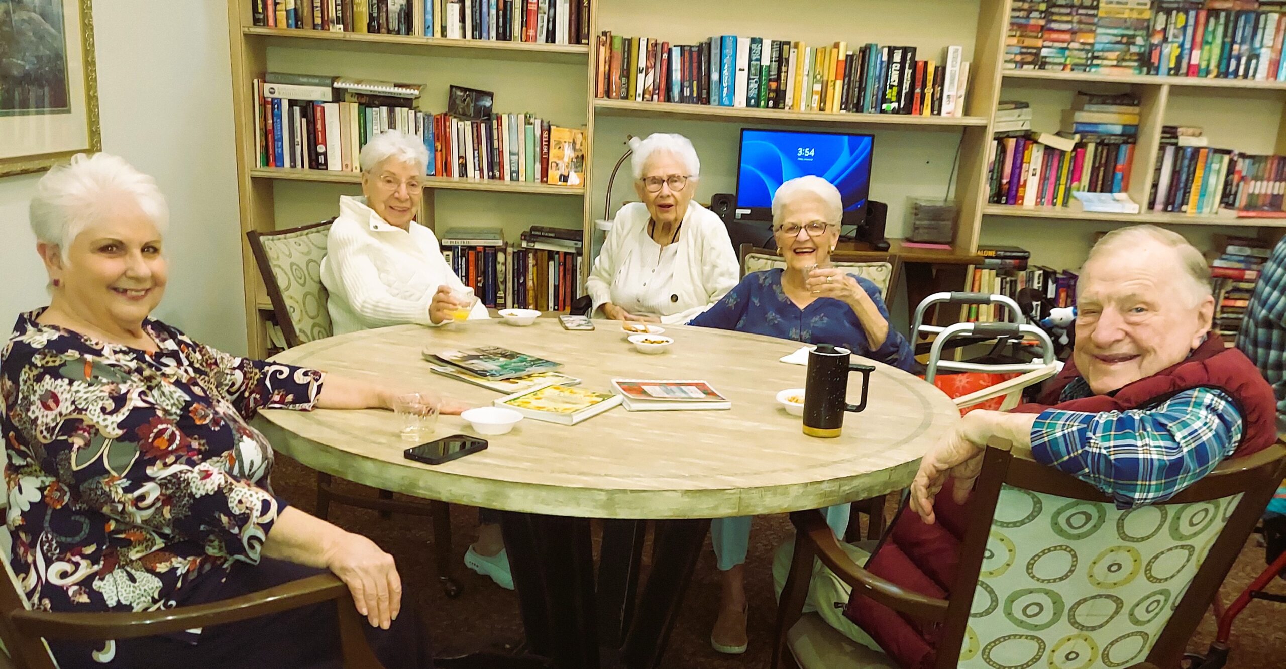 Residents enjoying a social gathering in a common area