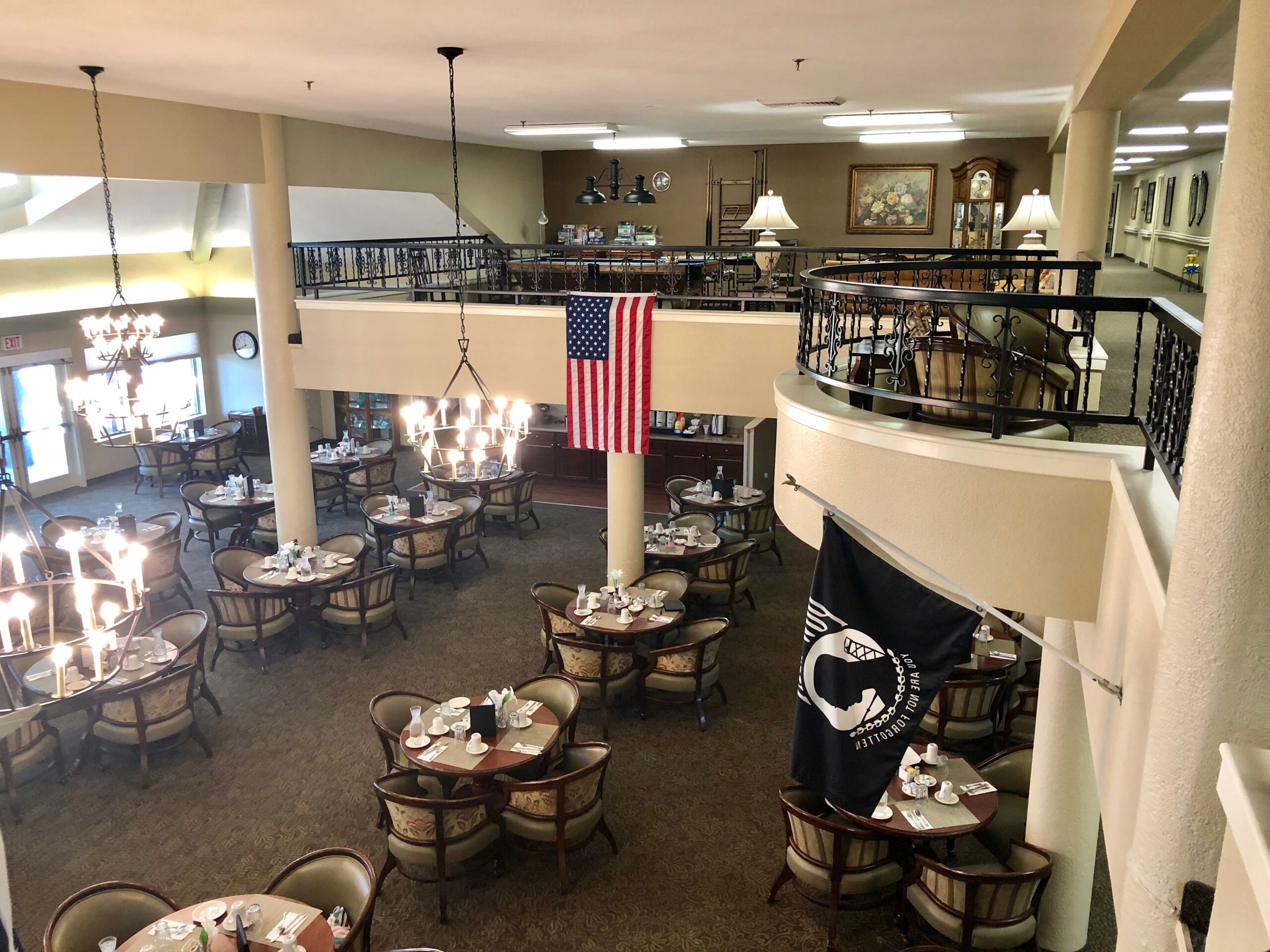Dining area with tables and American flag