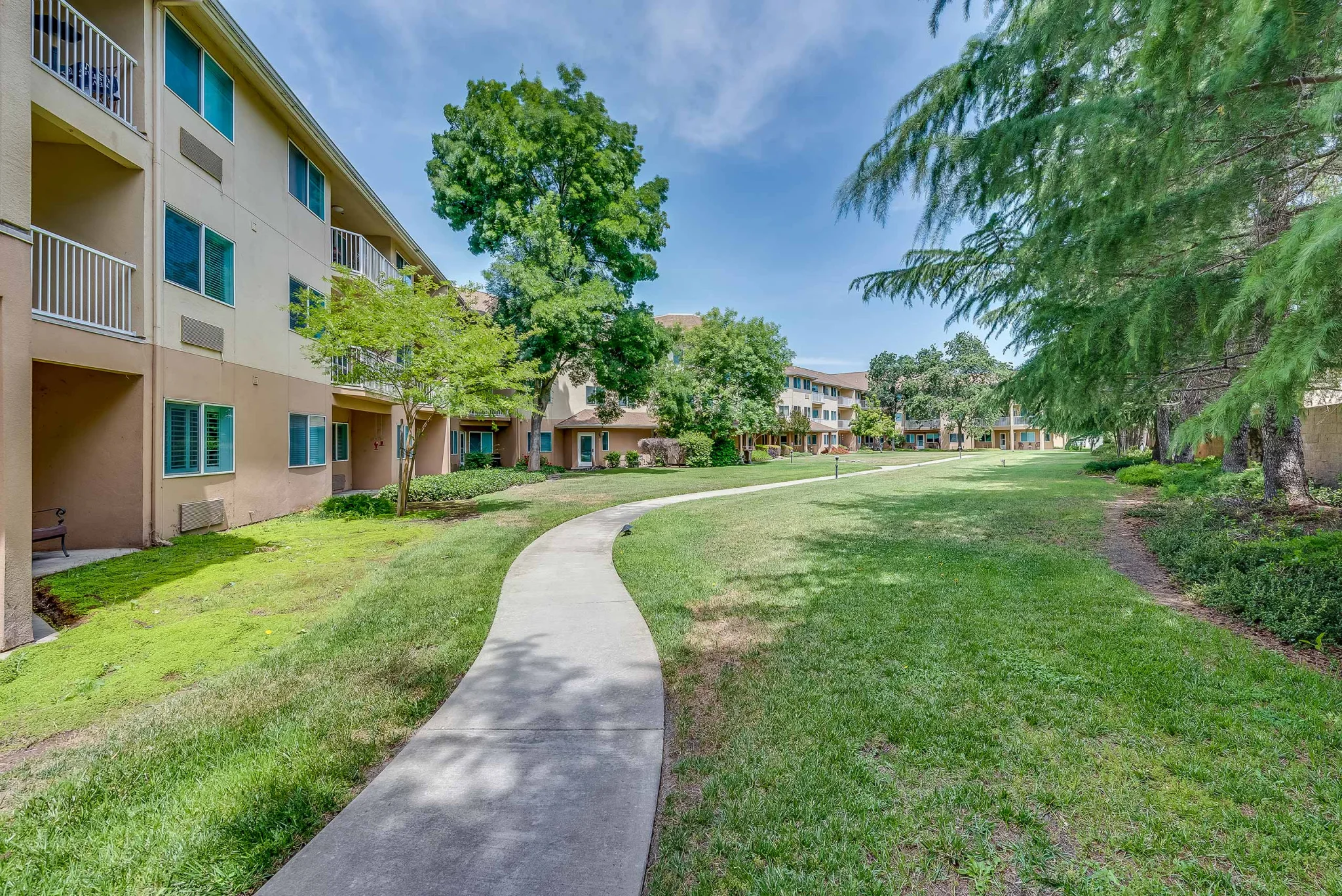 Pathway through landscaped gardens at the facility