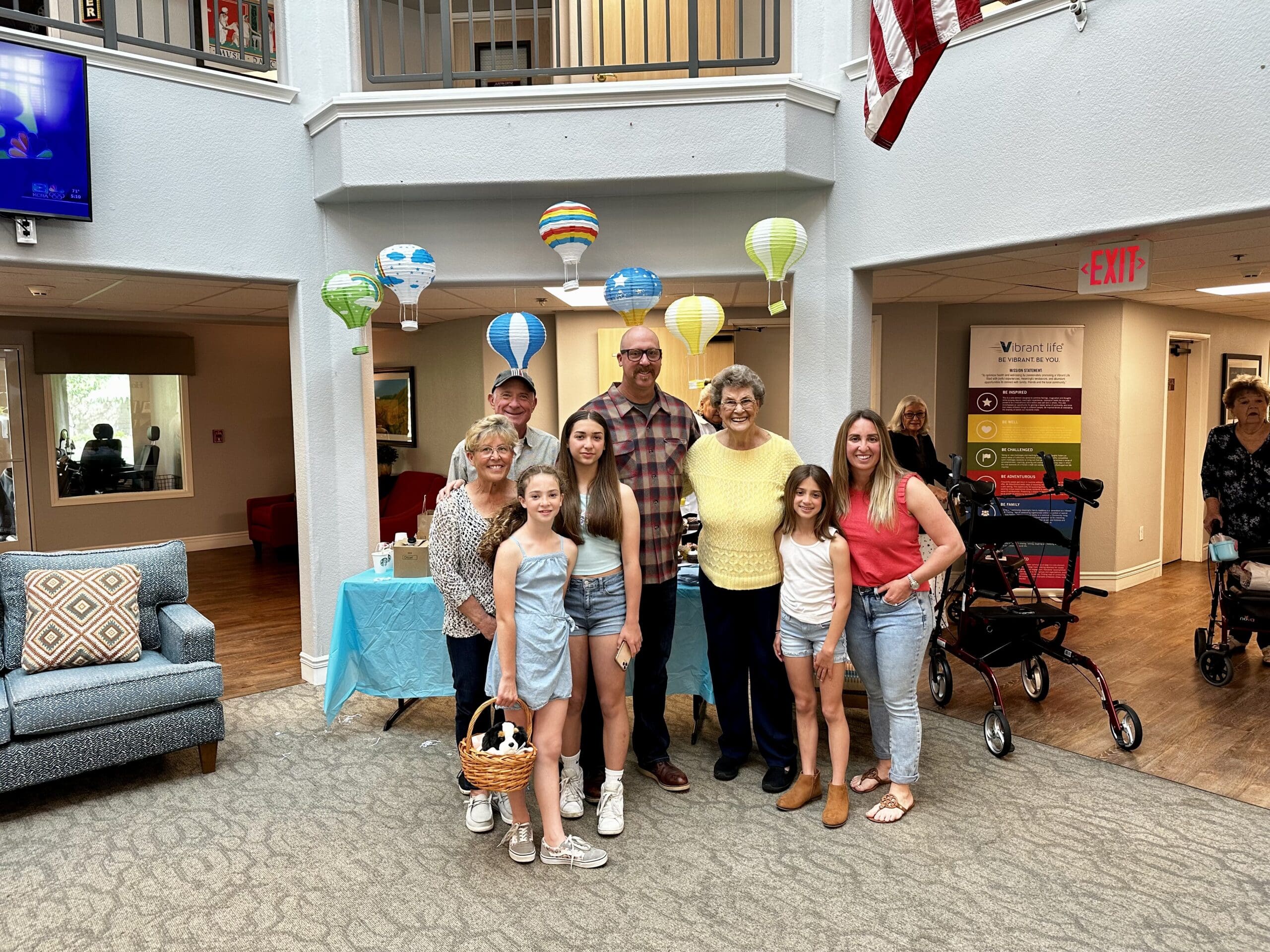 Residents and family celebrating in a common area
