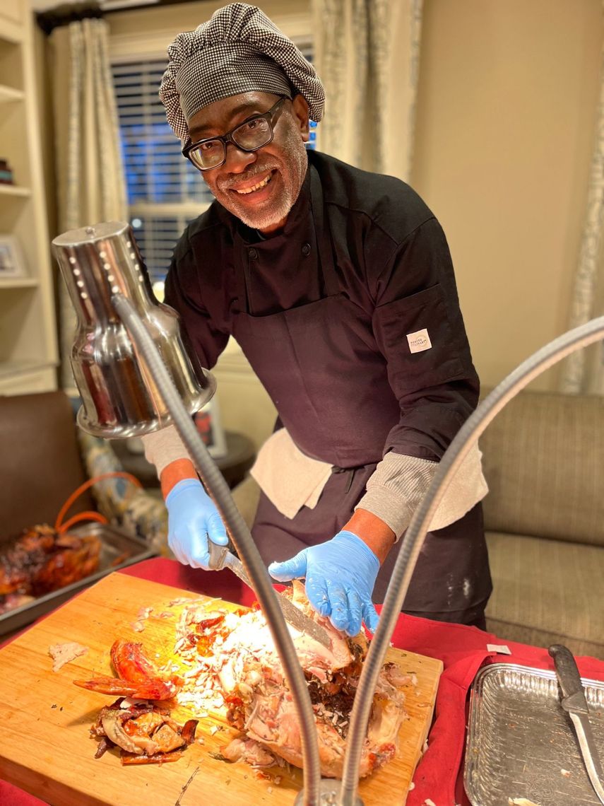 Chef preparing a meal in the common area