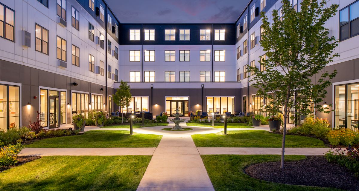 Beautifully landscaped outdoor courtyard at evening