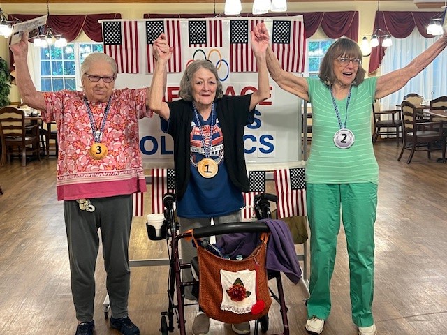 Residents celebrating during an event in a common area