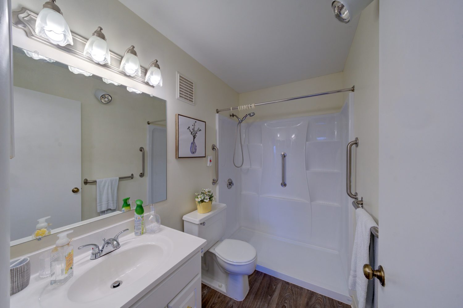 Bright bathroom with shower and vanity