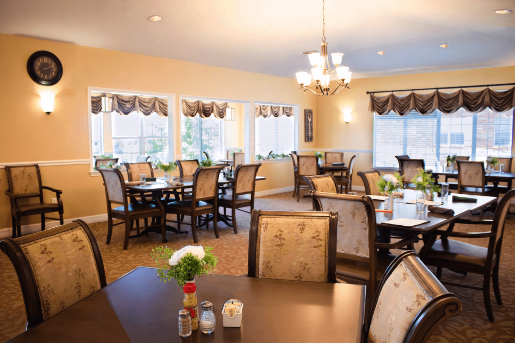 Dining area with tables and chairs set up