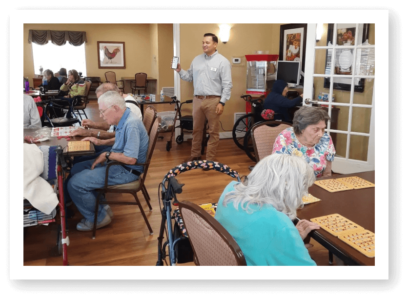 Residents engaged in a bingo game activity.
