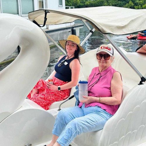 Residents enjoying a boat ride on a lake.