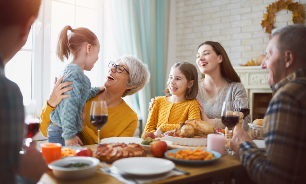 Family gathering around a festive meal