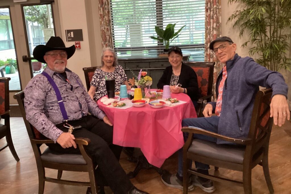 Residents enjoying a meal in the dining area.