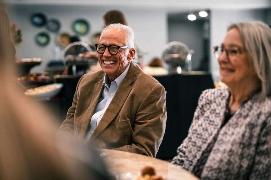 Seniors enjoying a social gathering at a facility
