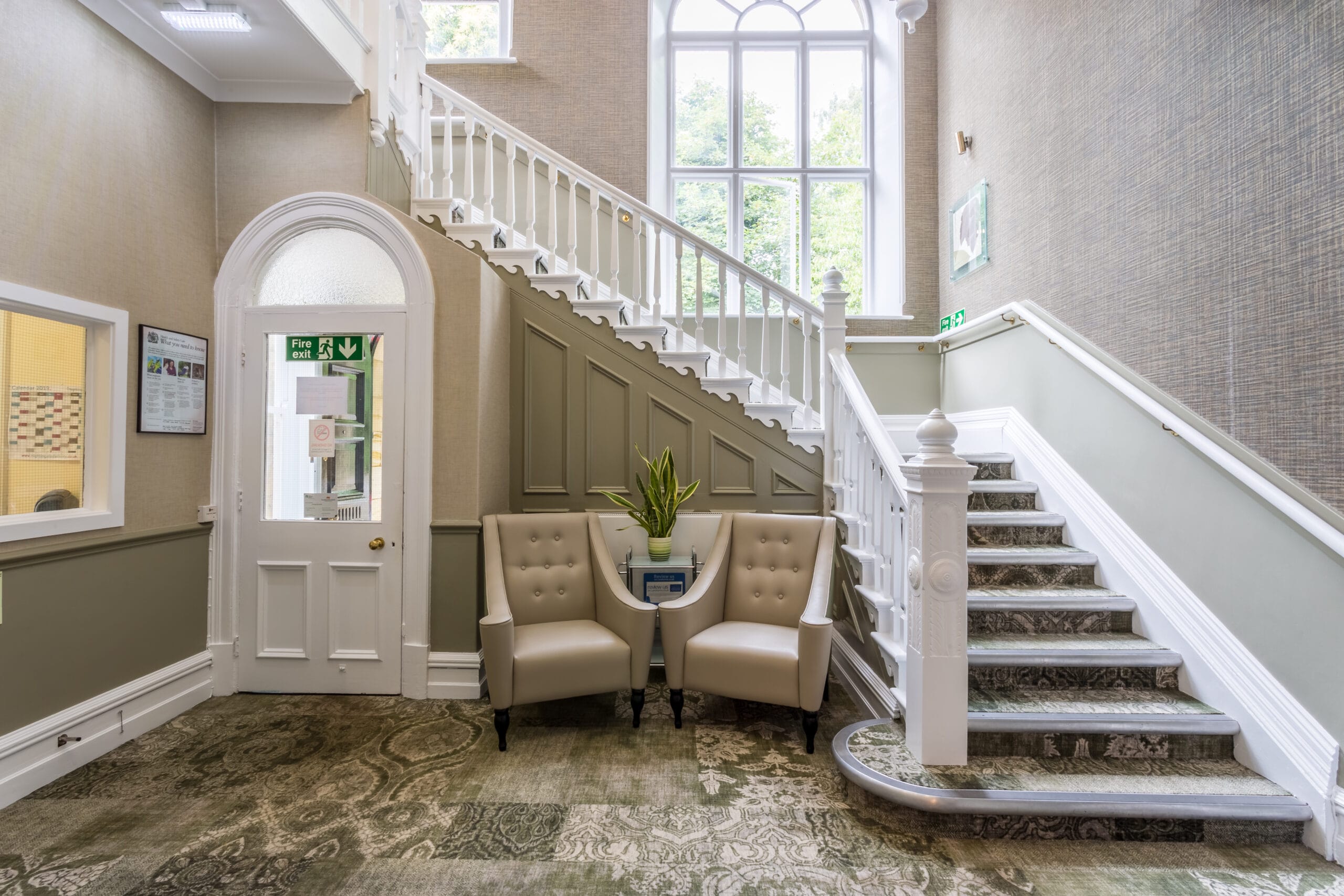 Interior view of a stairwell and seating area