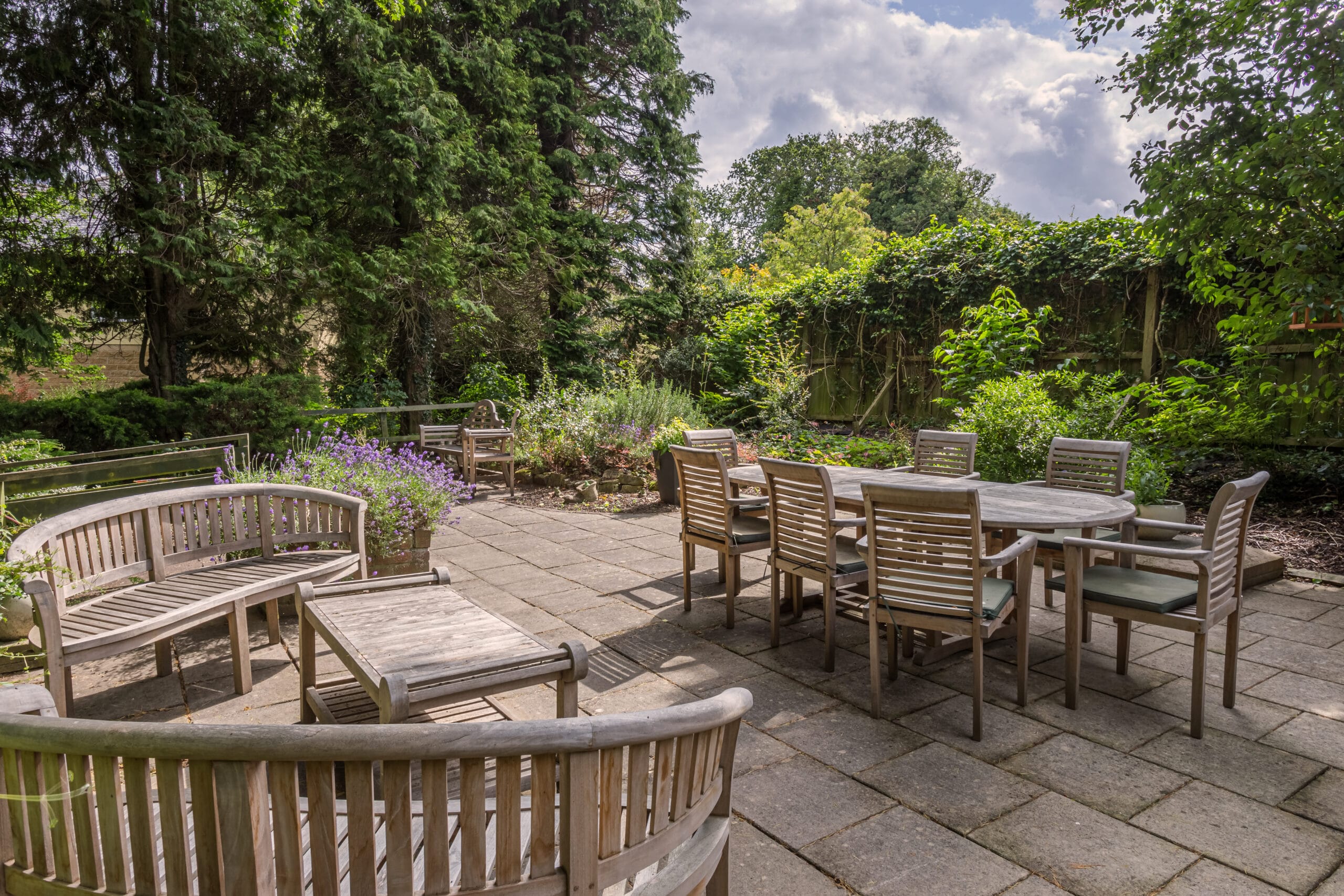 Outdoor seating area with tables and chairs