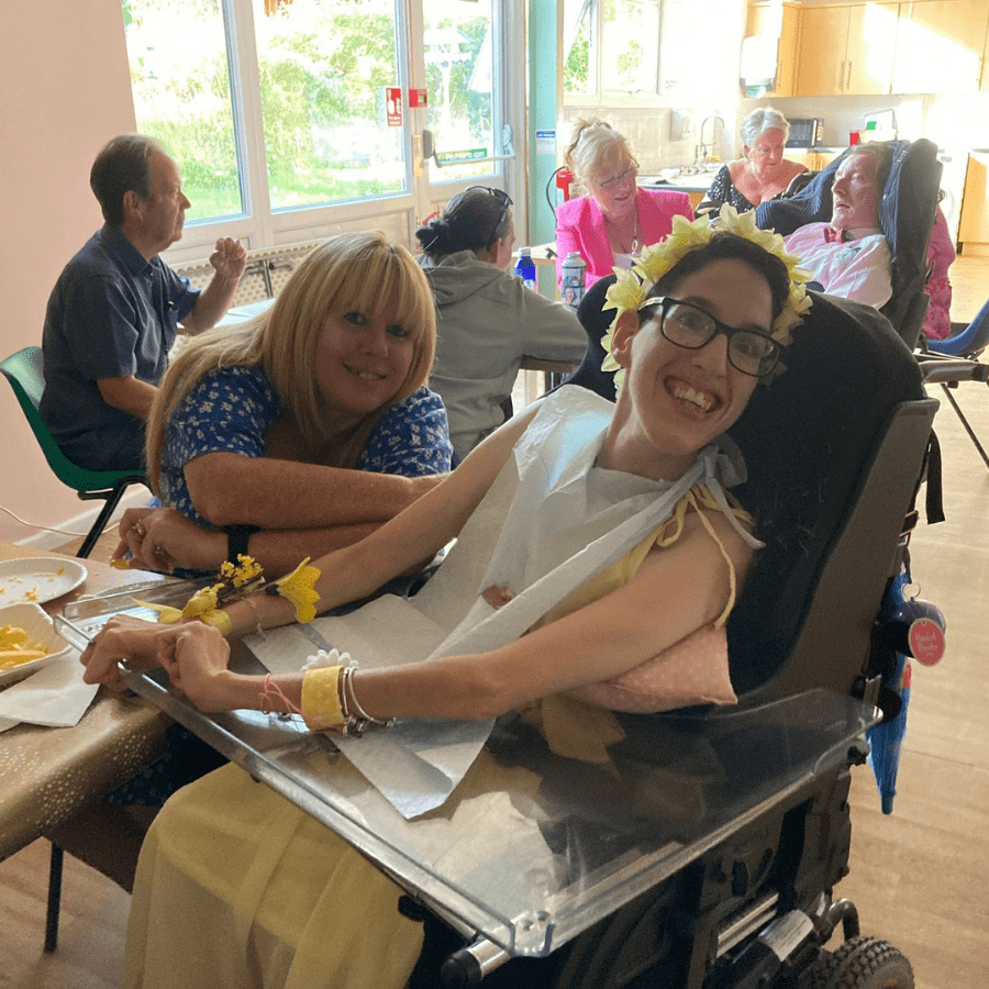 Residents and staff engaging in a joyful activity.