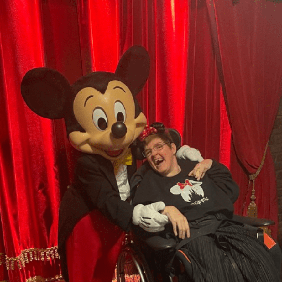 Resident enjoying time with a character.