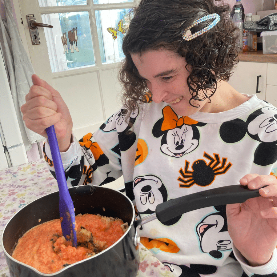 Resident engaging in cooking activity