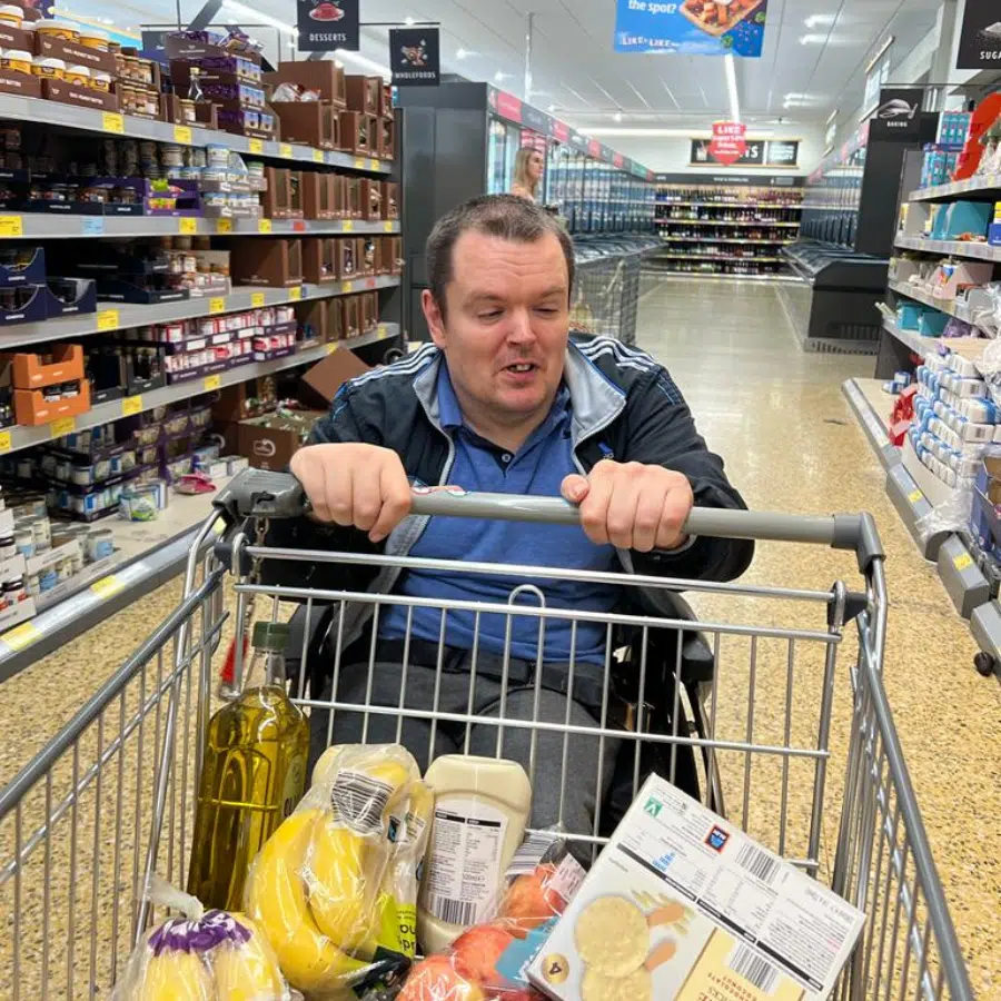 Resident shopping in a grocery store