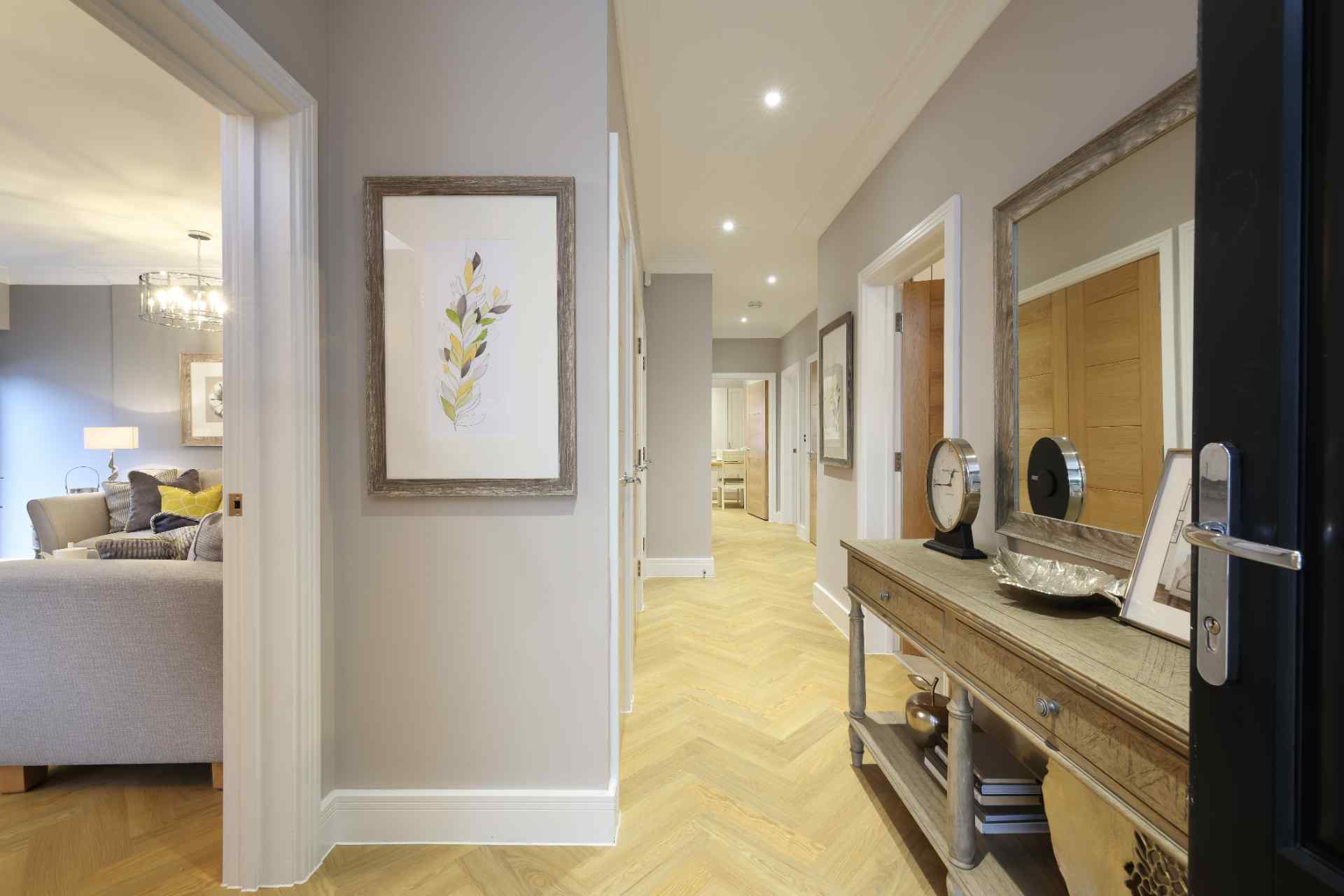 Well-decorated hallway in a residential facility.