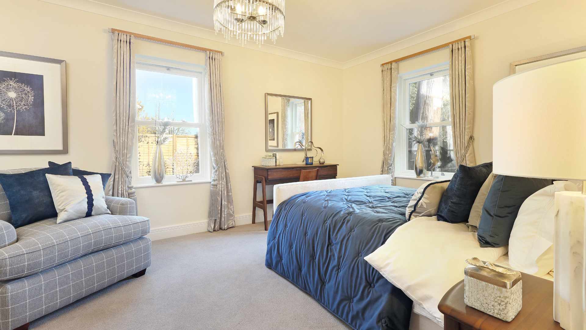 Well-furnished resident room with natural light.