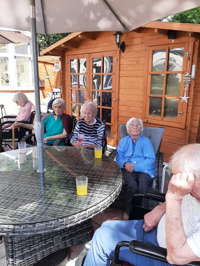 Seniors enjoying time outdoors at Ruddington Retirement Village.