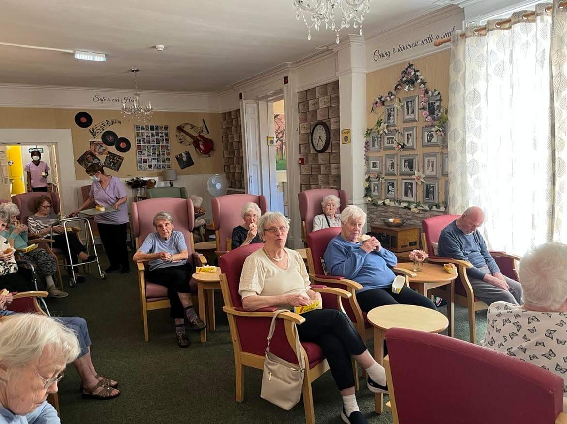 Residents enjoying a common area in the facility