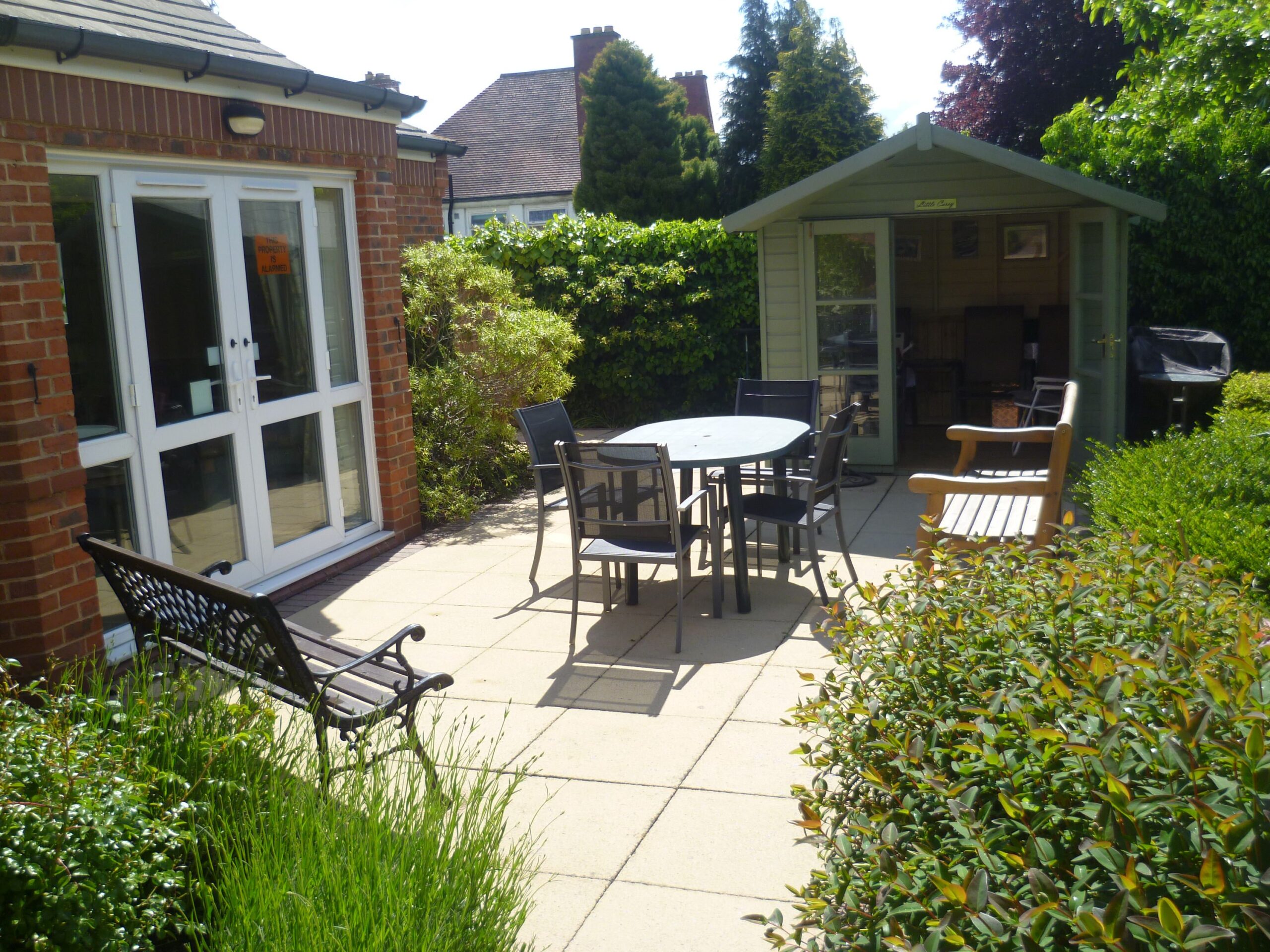 Outdoor seating area with garden space