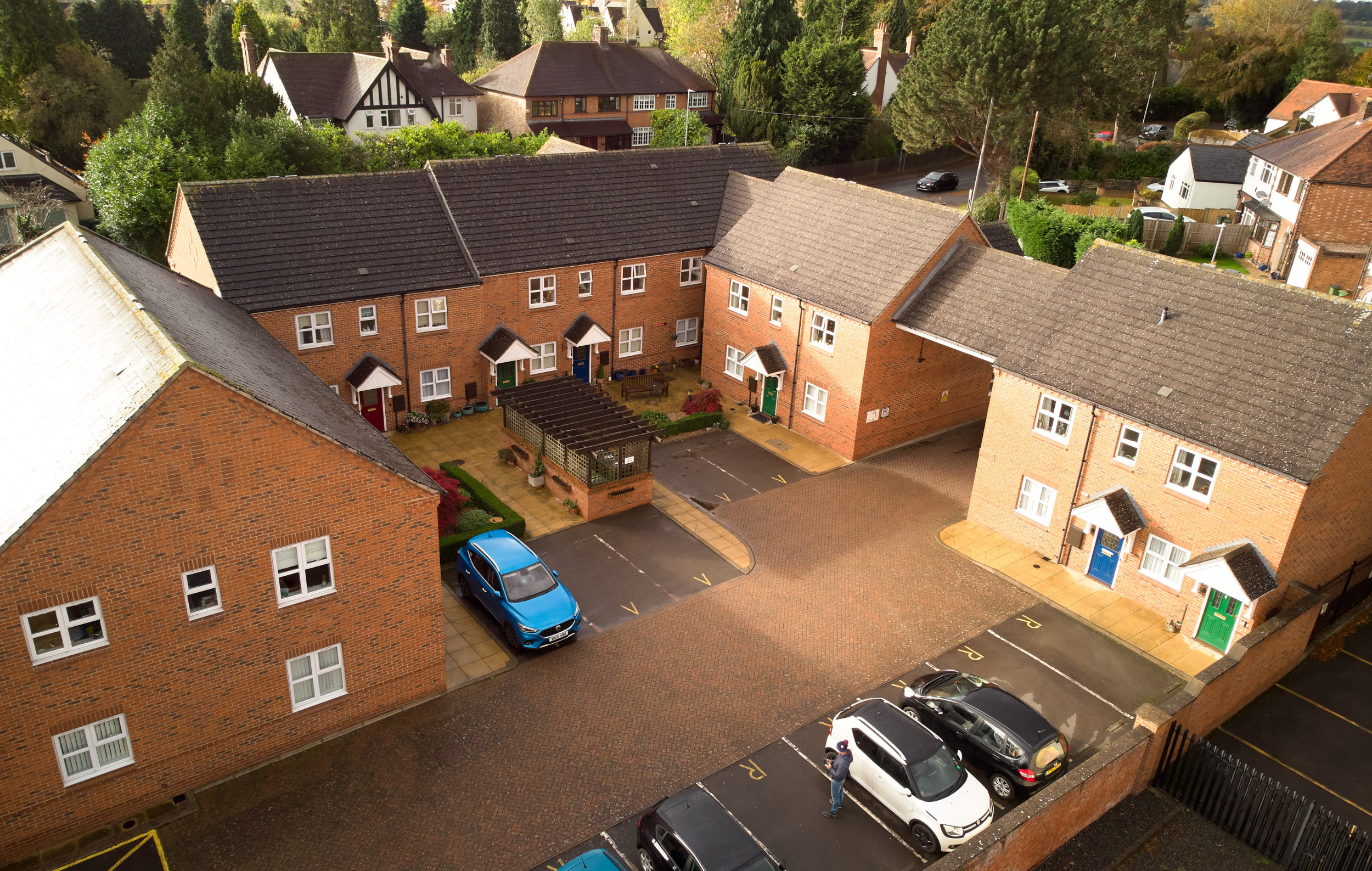 Aerial view of a residential layout with buildings.
