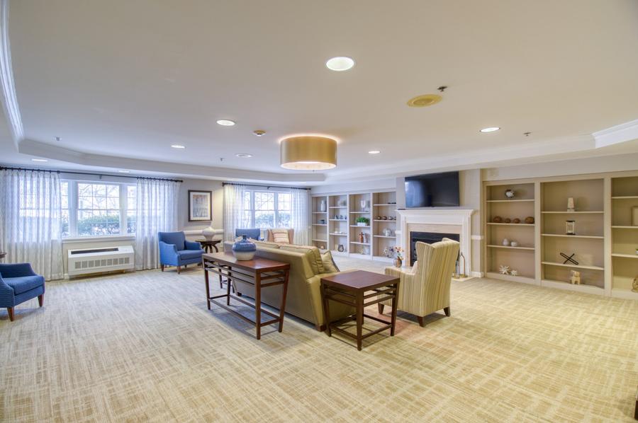 Common area with seating and a fireplace