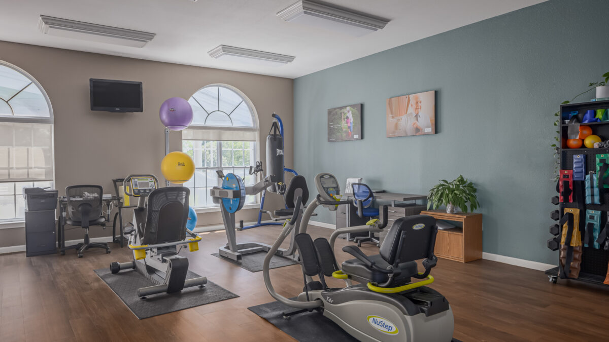 Interior view of a fitness room with exercise equipment
