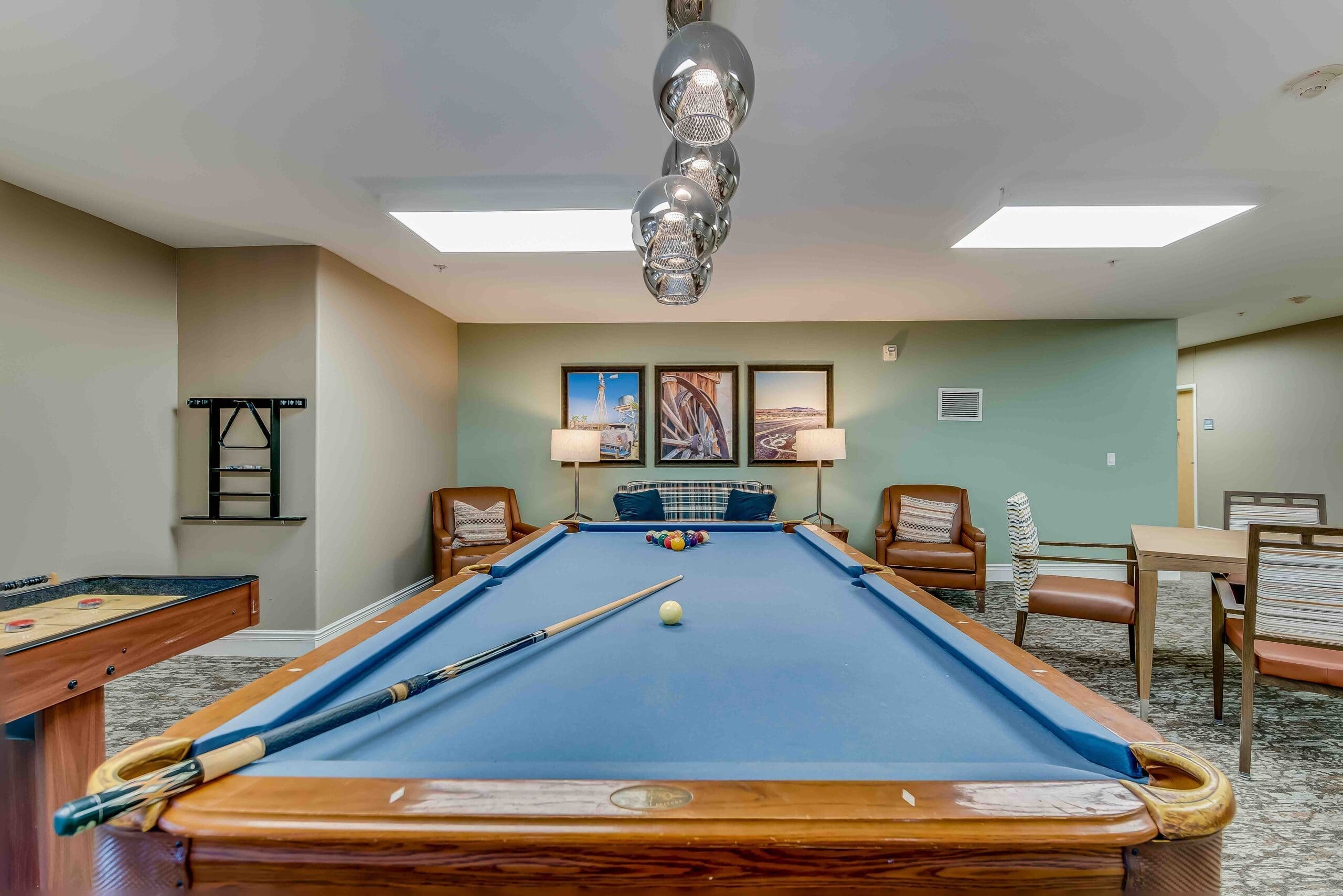 Interior view of a common area with a pool table