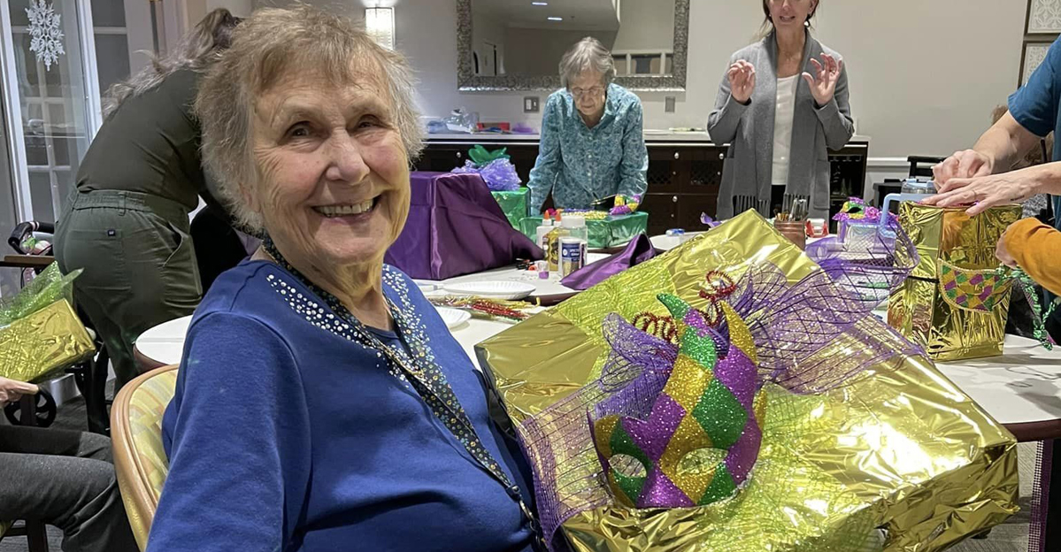 Residents enjoying a craft activity in the common area