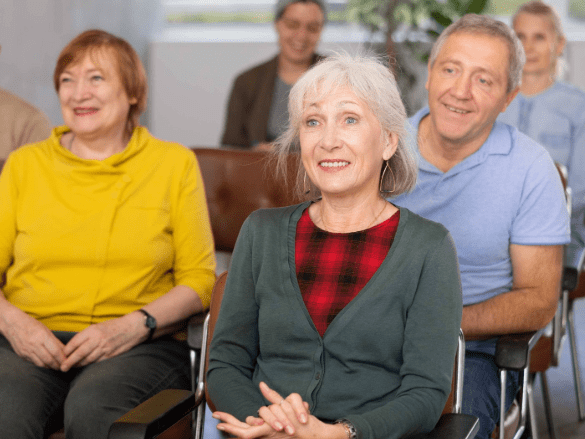 Residents attending a social activity in a common area