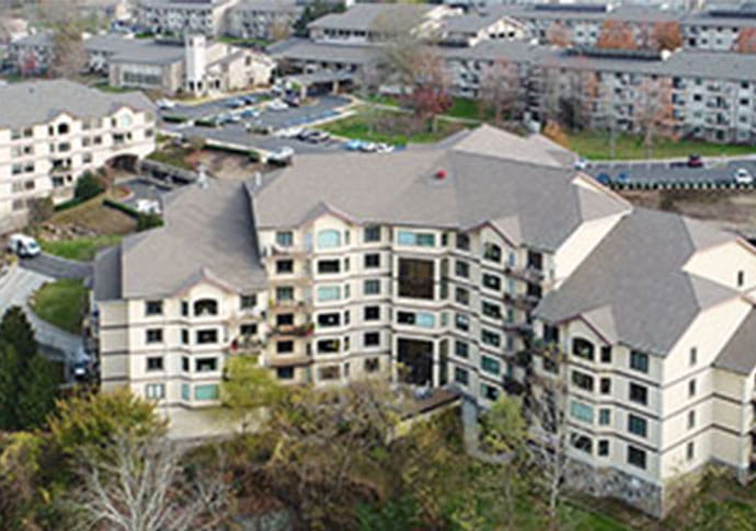 Aerial view of the assisted living facility with parking area