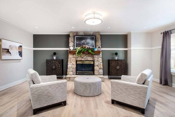 Bright and inviting lounge area with chairs and decor