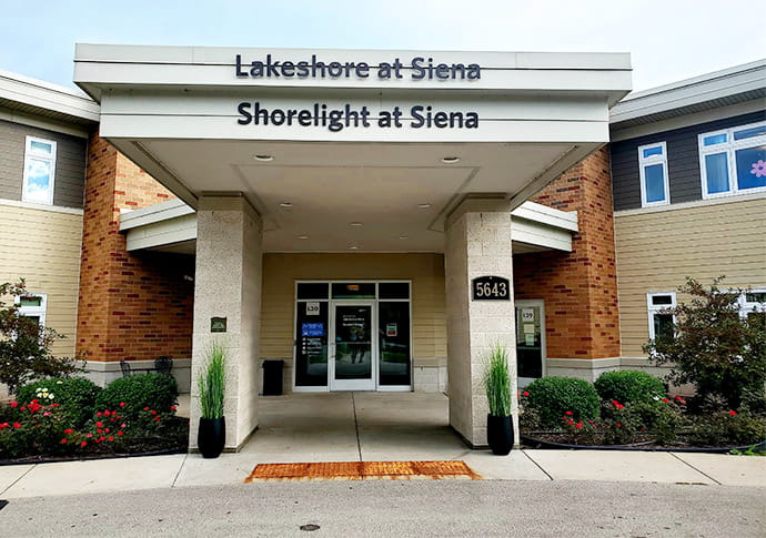 Exterior view of a senior living facility entrance