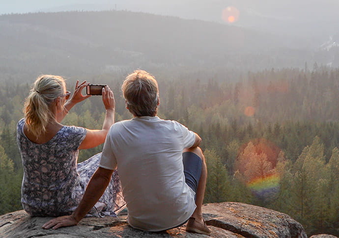 Older couple enjoying a scenic view outdoors