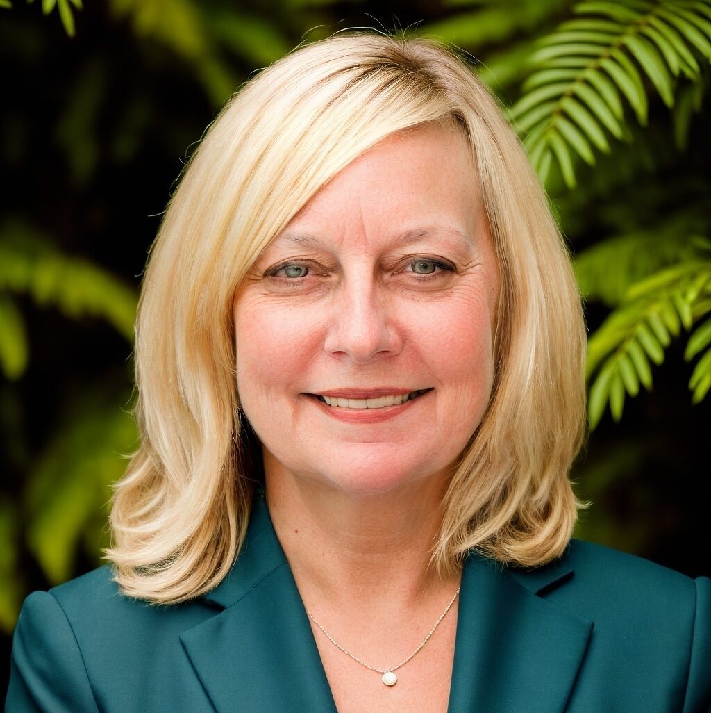 Portrait of a woman with a green background