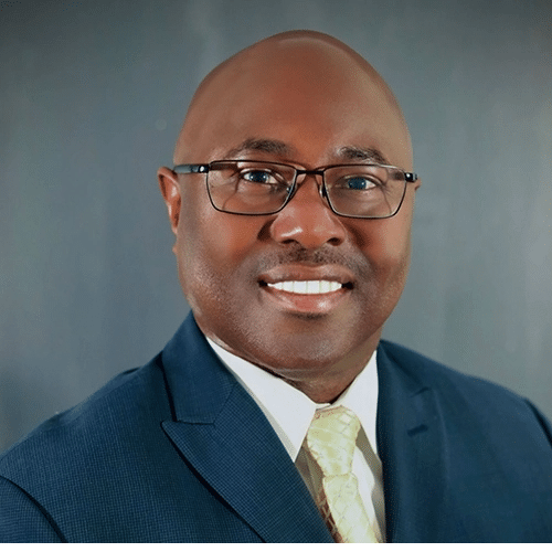 Professional portrait of a staff member in a suit