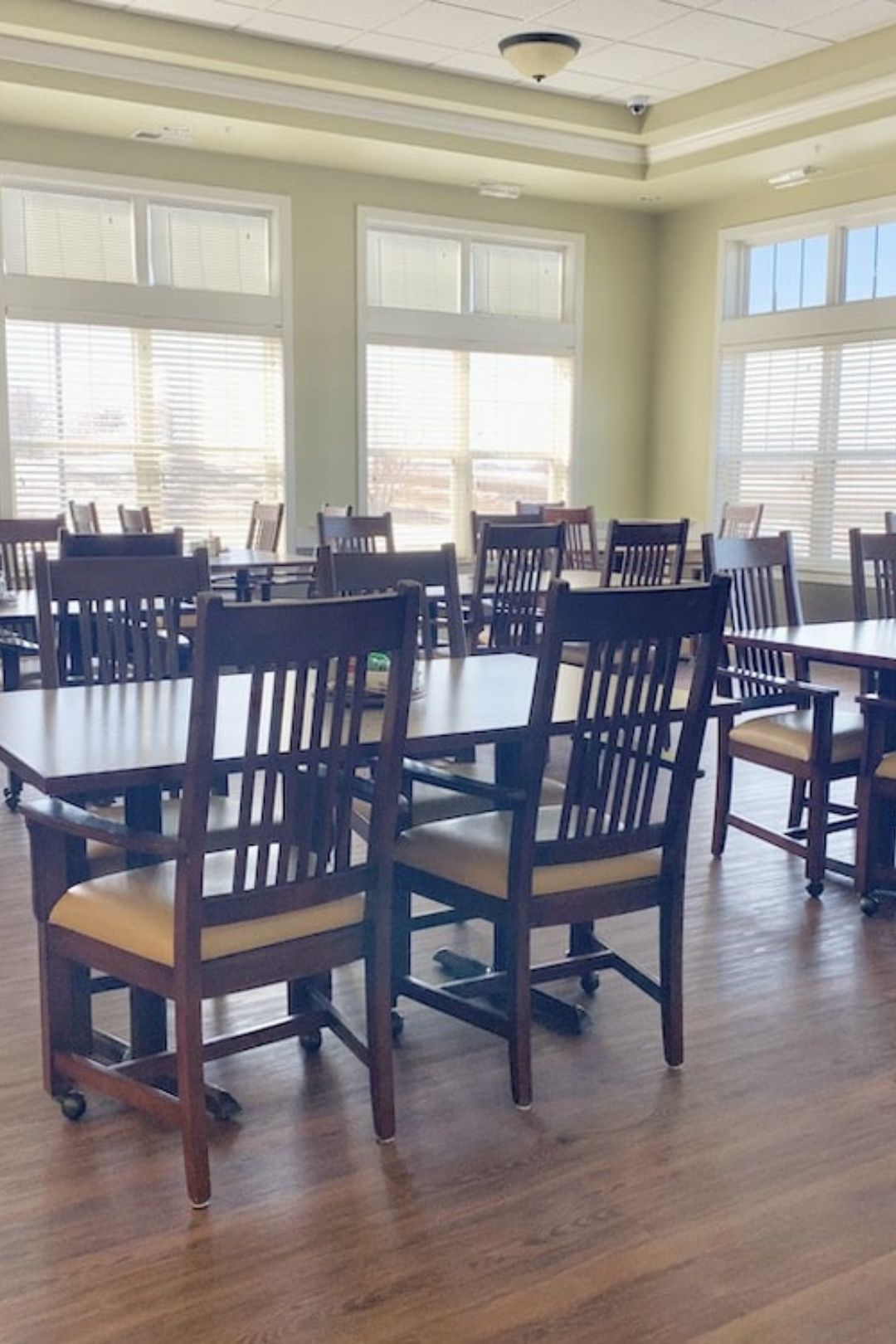 Dining area with wooden chairs and tables