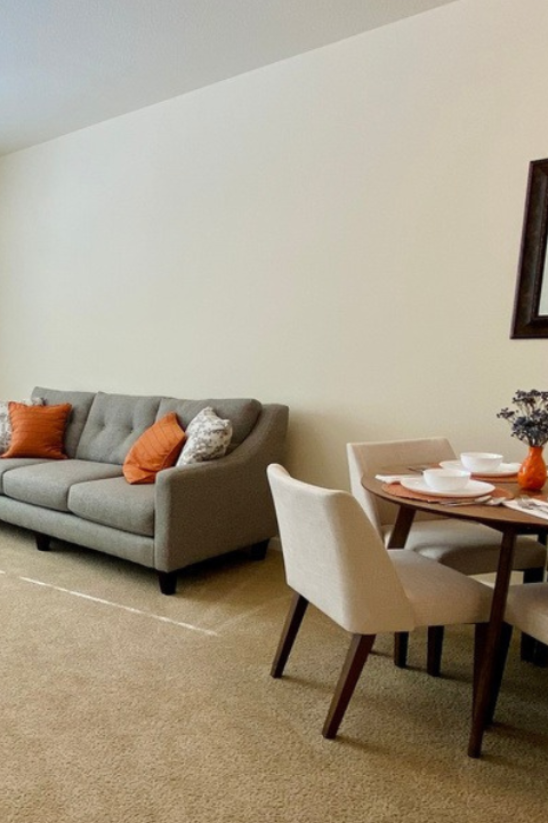 Cozy living space with a couch and dining table