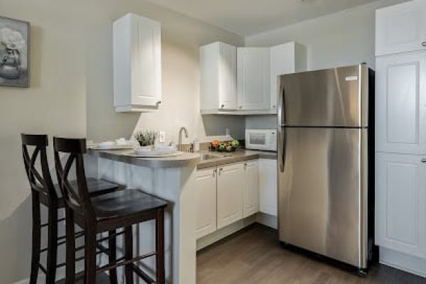 Bright interior kitchen area with dining space