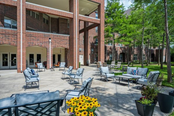Outdoor seating area with plants and seating