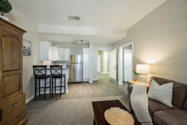 Interior view of a resident unit with kitchen and living area