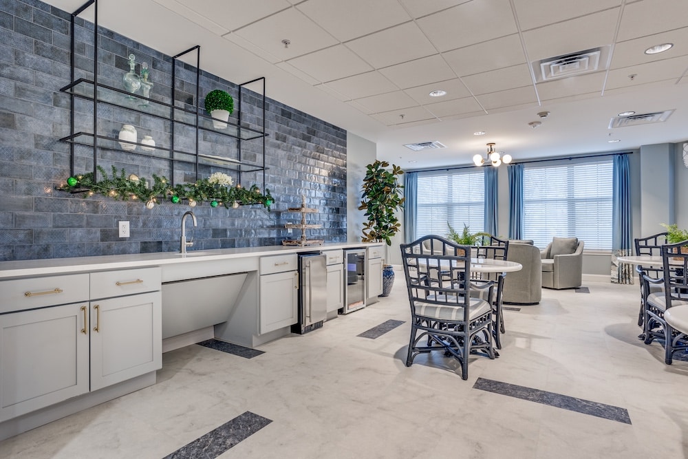 Bright common area with seating and decor