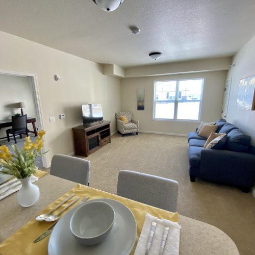 Cozy living area in a resident's unit with soft furnishings