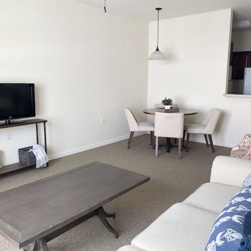 A cozy living area in a resident's room