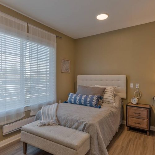 Cozy private bedroom with natural light