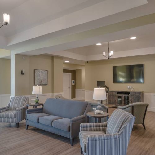 Common area with seating and a television