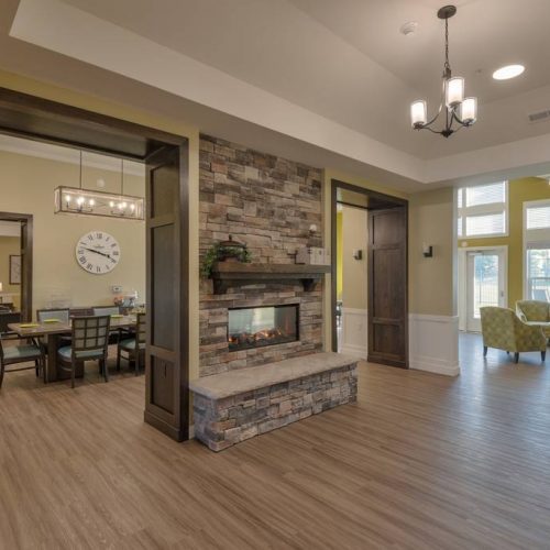Interior view of a common area with a fireplace