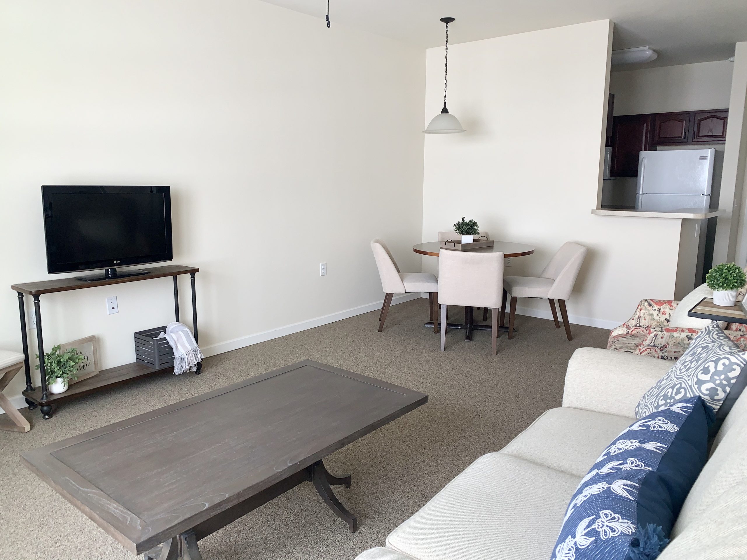 Cozy living area with a dining table and kitchenette