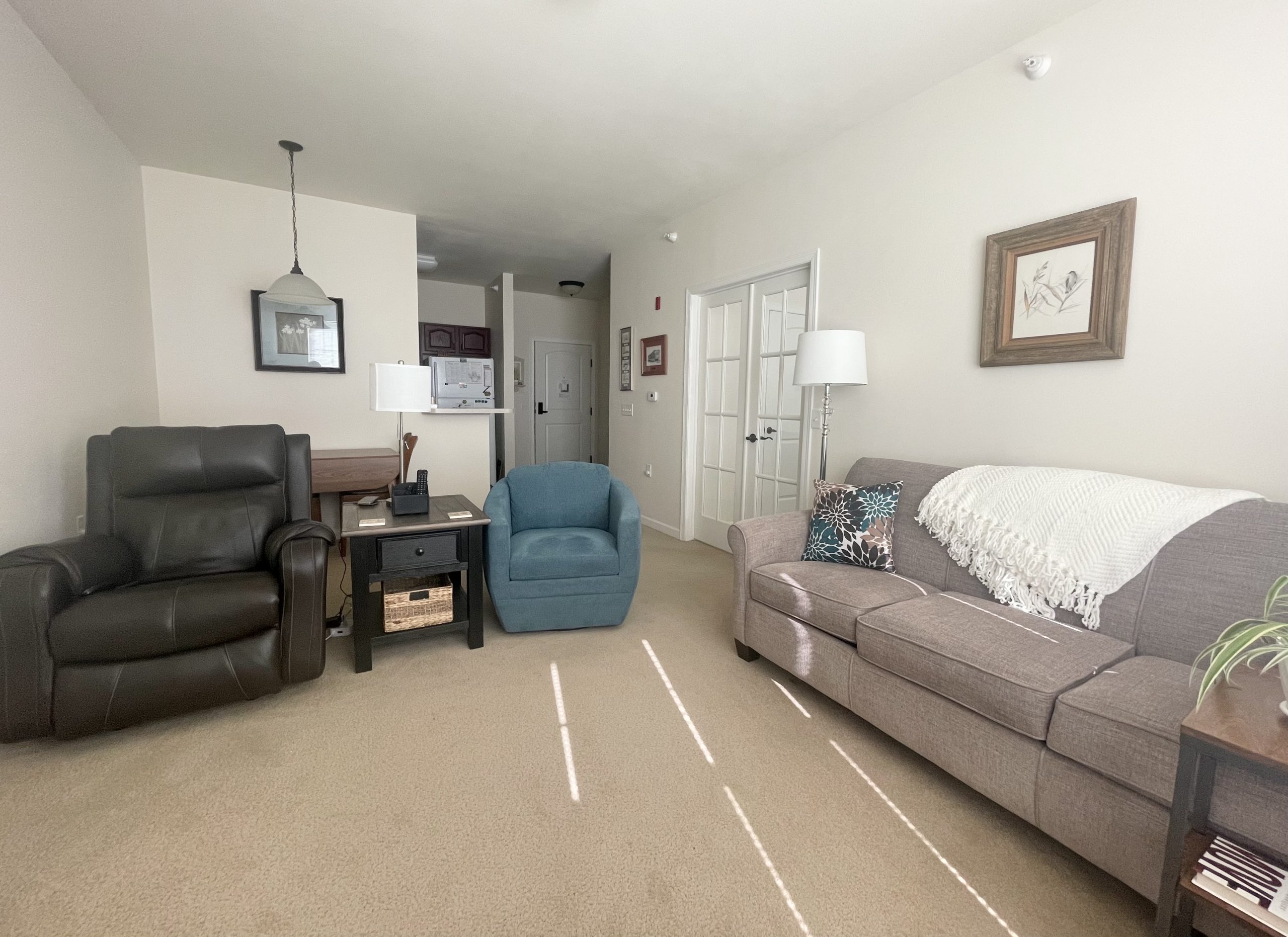 Cozy living area in a resident room with furniture